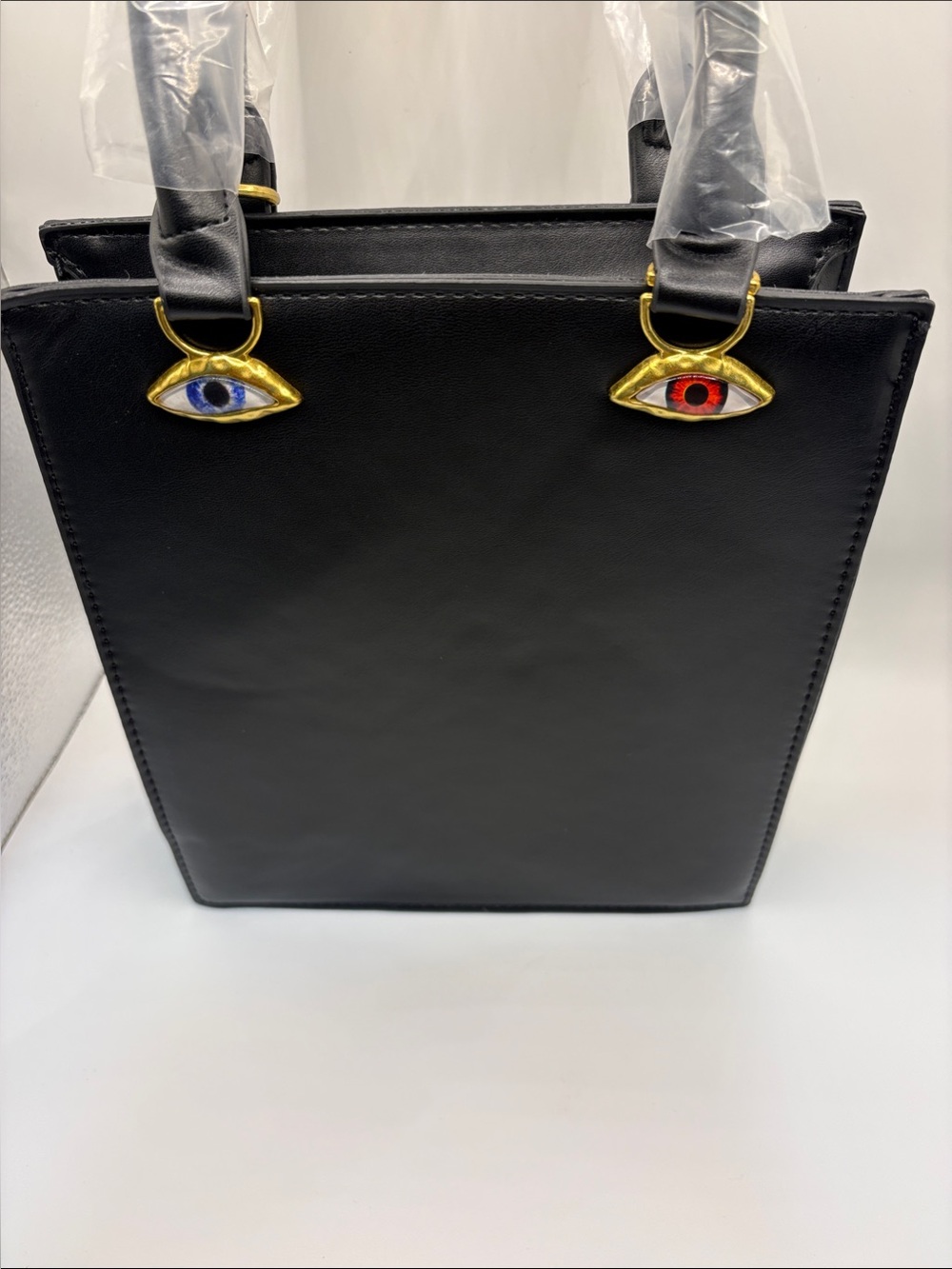 Black Novelty face-Accent Tote bag with gold detail - Picture 2 of 4